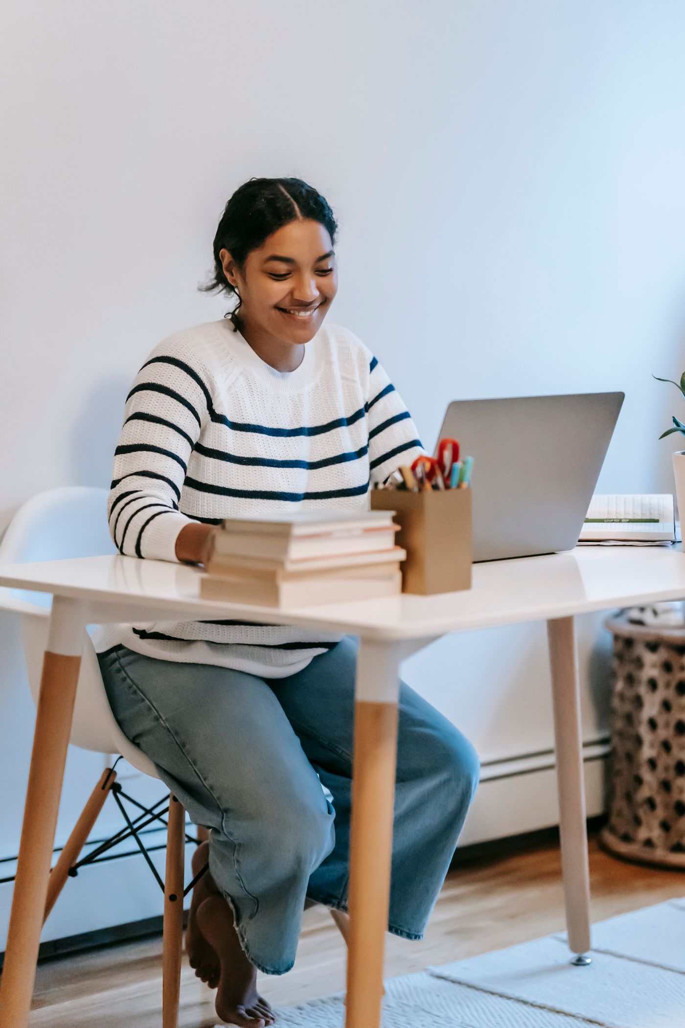 Indian professional building digital skills at her workspace